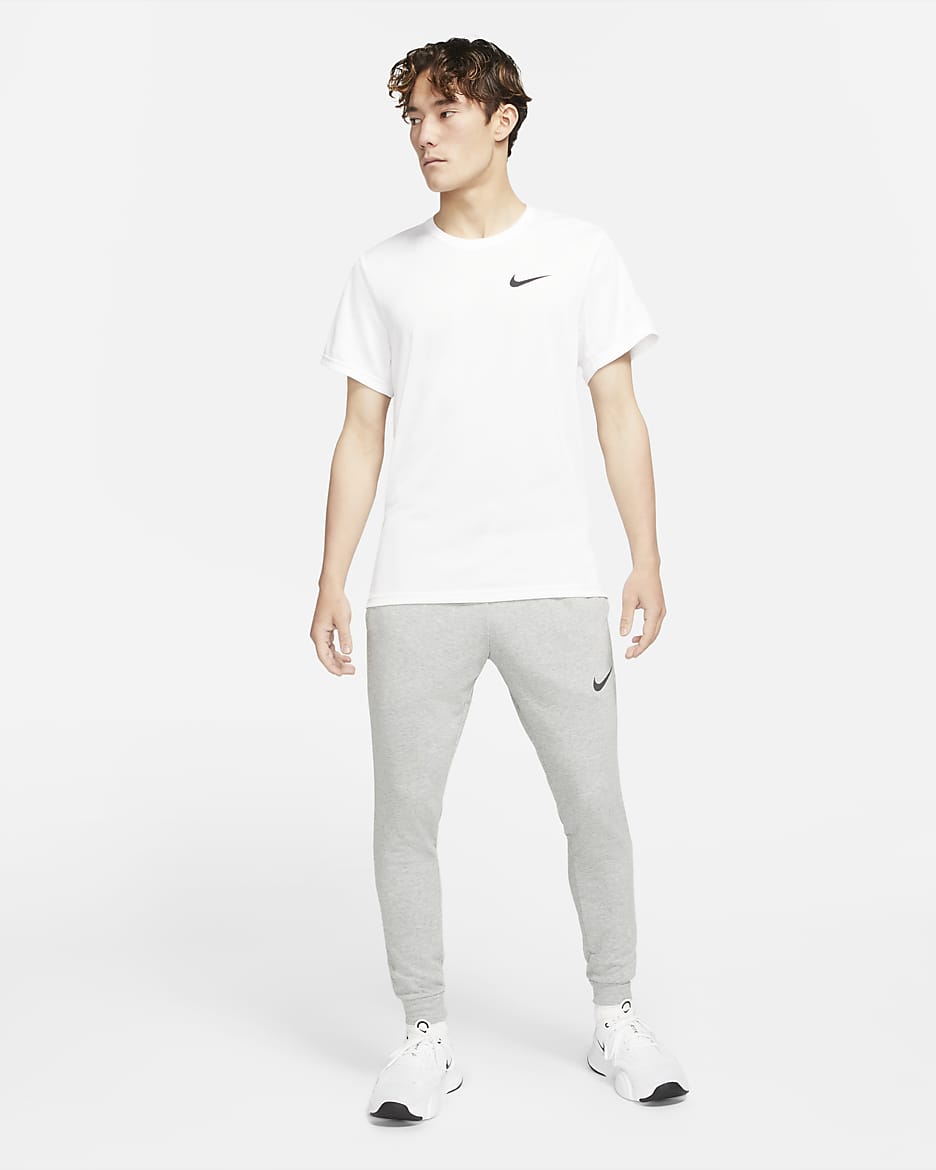 Nike dri fit tapered jogging bottoms mens online